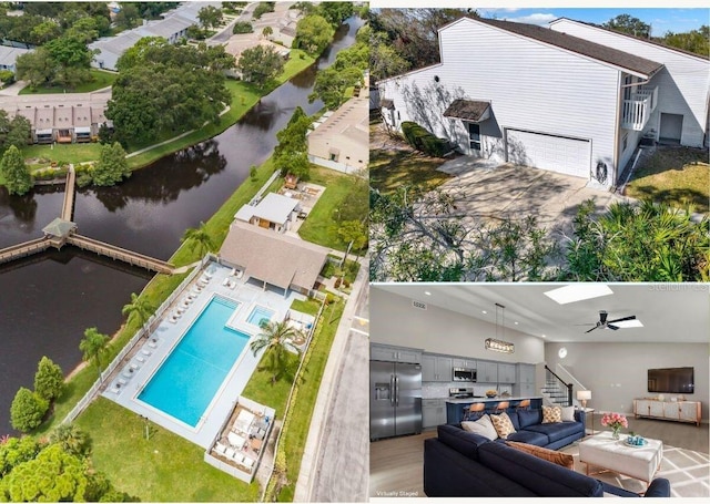 birds eye view of property with a water view