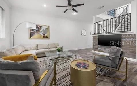 living room featuring ceiling fan