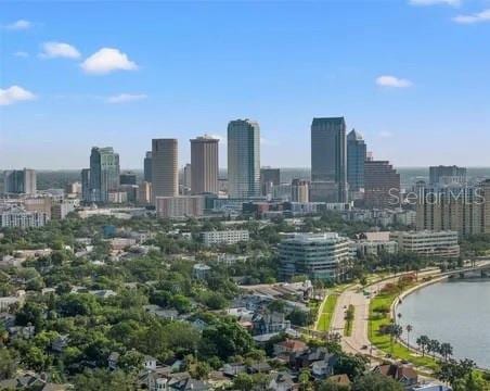 property's view of city with a water view