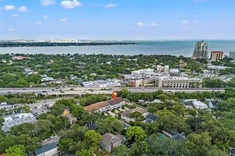 drone / aerial view with a water view