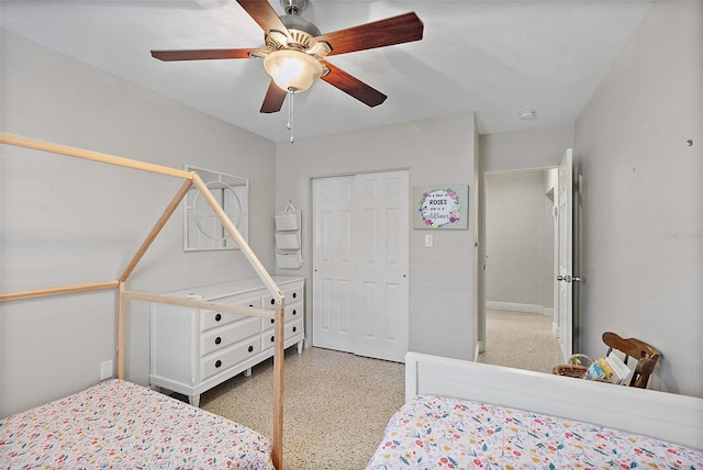 bedroom featuring a closet and ceiling fan