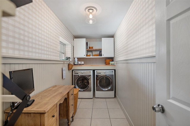 laundry room with light tile patterned flooring and independent washer and dryer