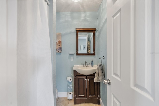 bathroom featuring vanity and tile patterned floors