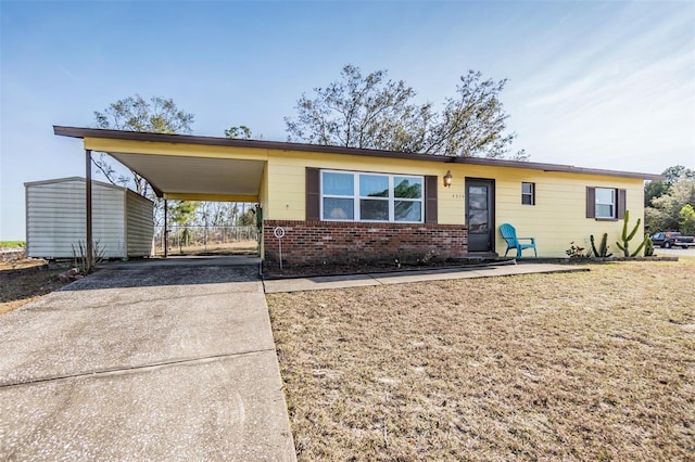 single story home with a carport