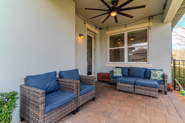 view of patio / terrace featuring an outdoor living space and ceiling fan