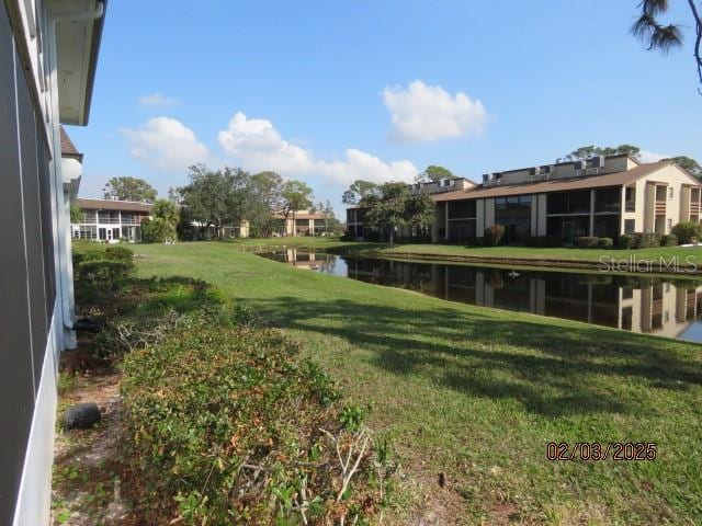 view of yard with a water view