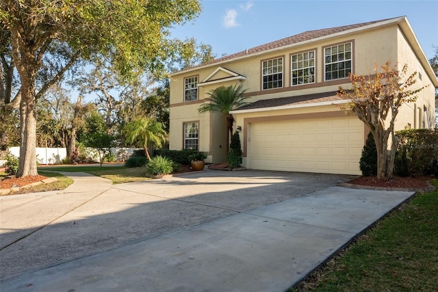 view of front of home with a garage