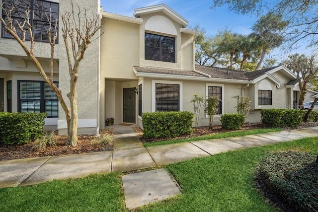 view of front of house featuring stucco siding