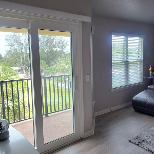 entryway with light hardwood / wood-style floors