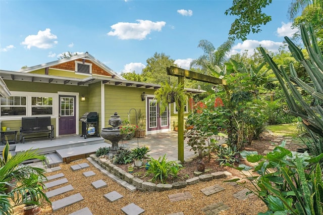 rear view of property with a patio