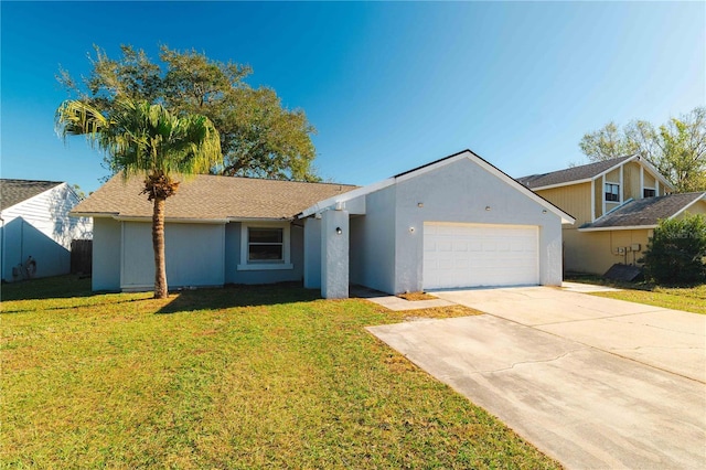 ranch-style house featuring a garage and a front lawn