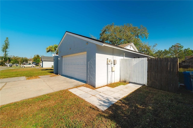 garage with a lawn