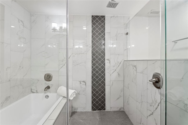 full bath featuring tile walls