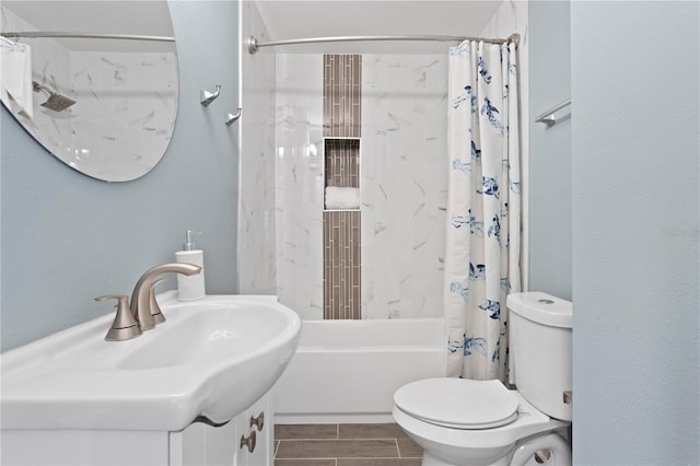 bathroom featuring shower / bath combination with curtain, a textured wall, toilet, wood tiled floor, and vanity