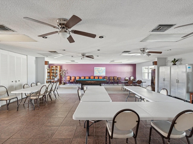 rec room featuring a textured ceiling, tile patterned flooring, billiards, and visible vents