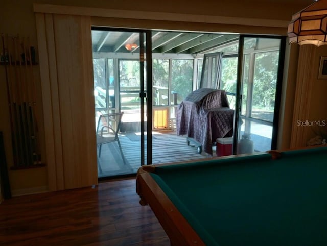 entryway featuring dark wood-type flooring and billiards