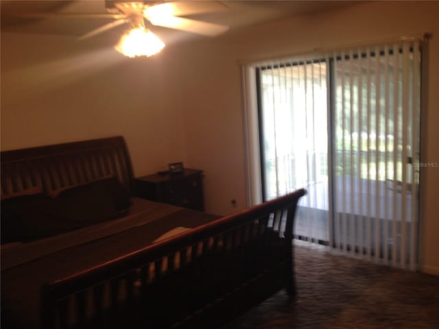 bedroom with access to exterior, ceiling fan, and carpet flooring