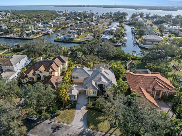 bird's eye view with a water view