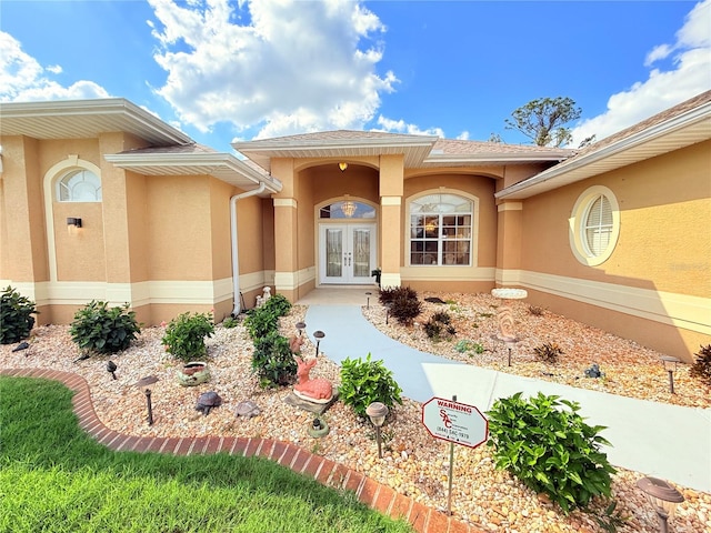 view of exterior entry with french doors