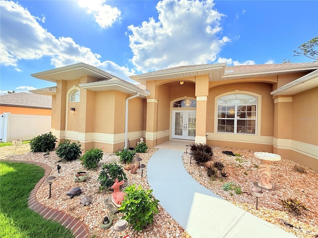 view of exterior entry with french doors