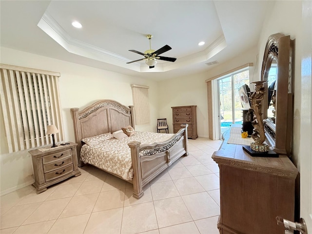 bedroom with ornamental molding, access to exterior, a raised ceiling, and light tile patterned floors