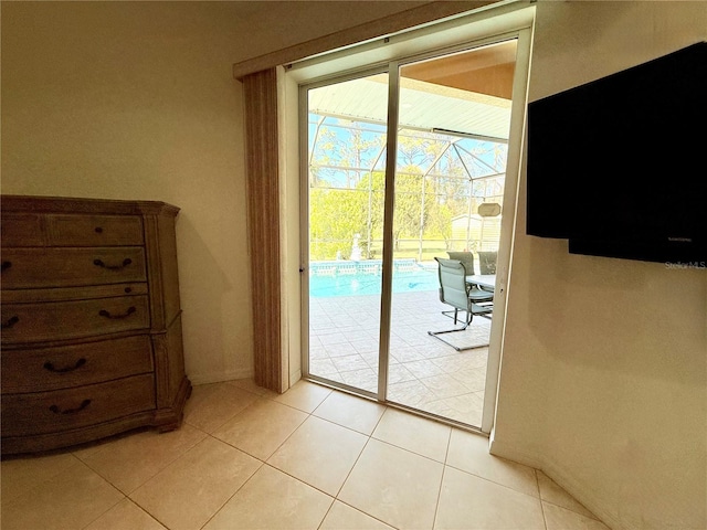 doorway to outside featuring light tile patterned floors