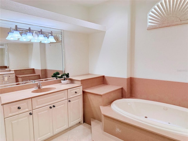 bathroom featuring vanity, a tub, and tile patterned floors