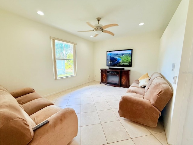 living room featuring light tile patterned floors and ceiling fan