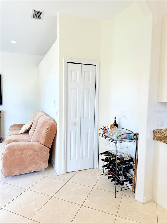 sitting room featuring light tile patterned flooring