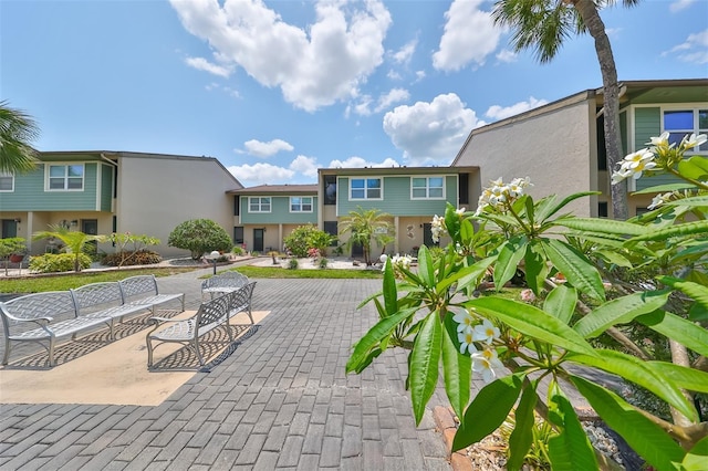 view of community with a patio area