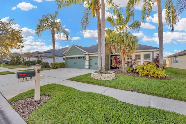 ranch-style home featuring a garage and a front yard