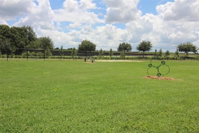 8731 SW 57th Ln, Ocala, FL 34481 - view of community featuring a lawn and a rural view