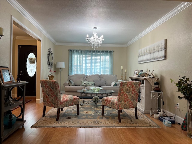 living room featuring ornamental molding, a wealth of natural light, and hardwood / wood-style floors