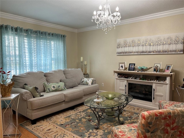 living room featuring crown molding, a chandelier, and wood-type flooring