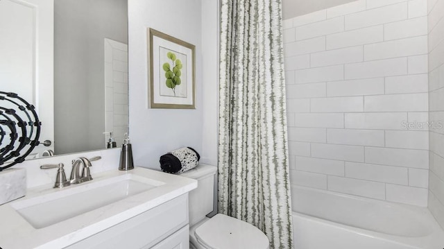 full bathroom with shower / tub combo, vanity, and toilet