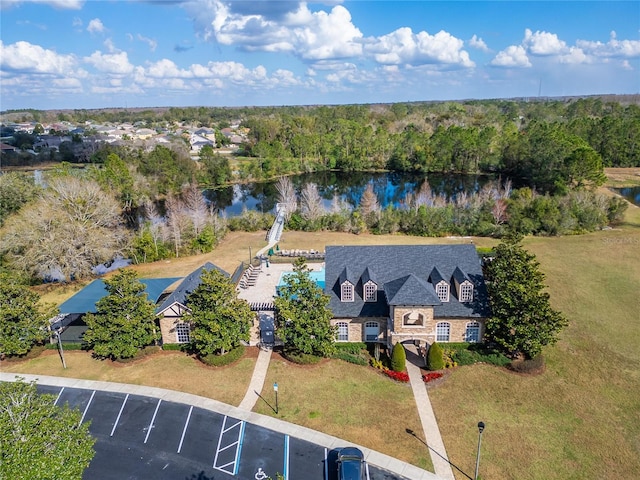 drone / aerial view with a water view