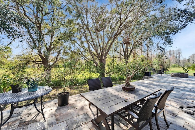 view of patio / terrace with a fire pit