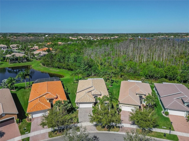 bird's eye view featuring a water view and a residential view