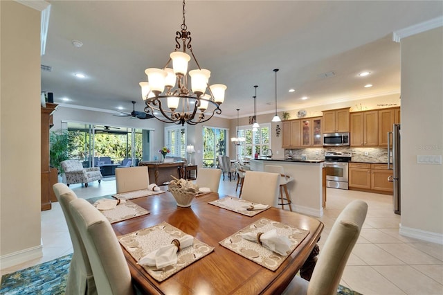 dining area with light tile patterned flooring, recessed lighting, crown molding, and baseboards