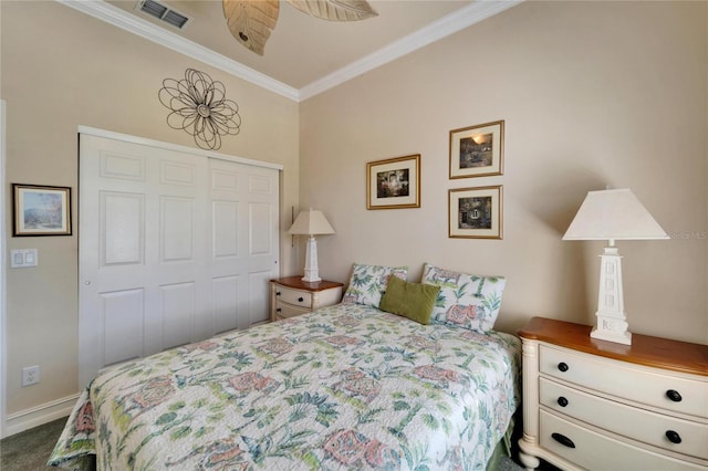 bedroom with baseboards, visible vents, ornamental molding, a closet, and dark colored carpet