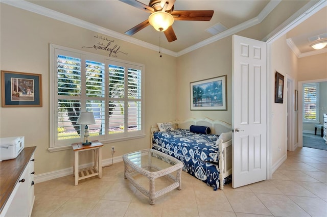 bedroom with light tile patterned floors, visible vents, baseboards, and crown molding