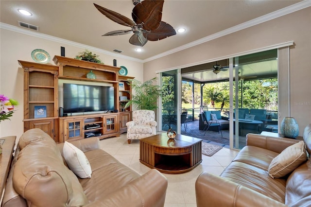 living area with crown molding, light tile patterned floors, and visible vents