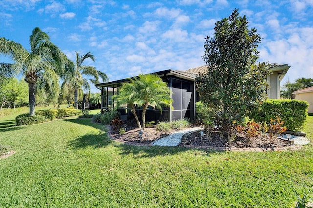 view of yard featuring a sunroom