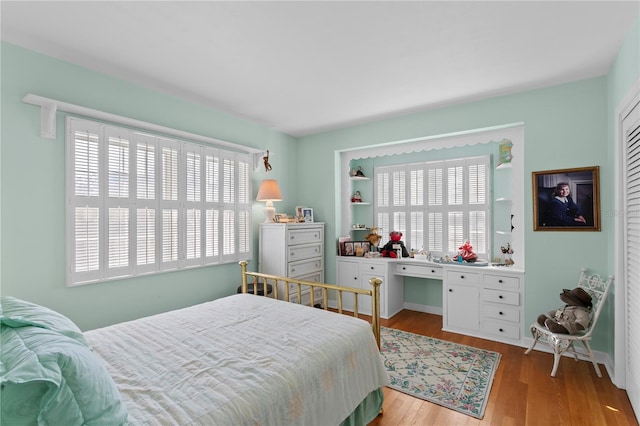 bedroom featuring light wood finished floors