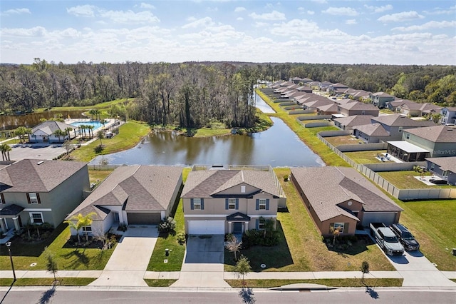 birds eye view of property featuring a water view