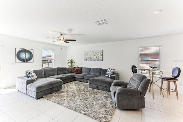 4323 Trotters Way, Lakeland, FL 33801 - tiled living room featuring ceiling fan