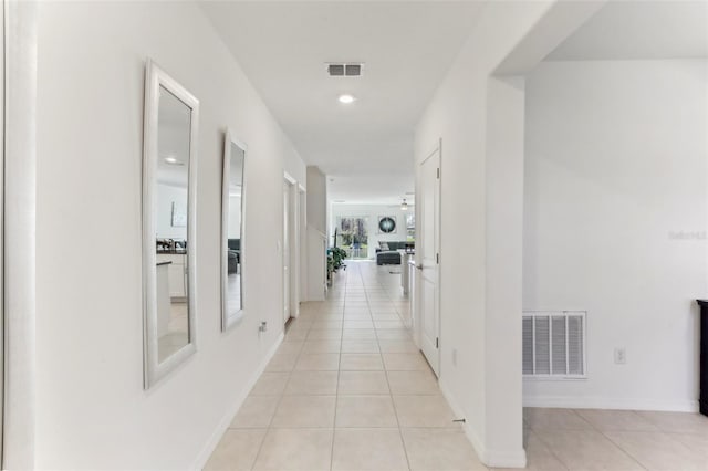 4323 Trotters Way, Lakeland, FL 33801 - hallway featuring light tile patterned flooring