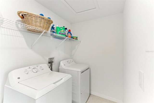 4323 Trotters Way, Lakeland, FL 33801 - washroom with washing machine and dryer and light tile patterned floors