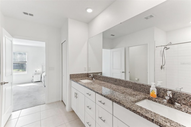 4323 Trotters Way, Lakeland, FL 33801 - bathroom with vanity, tiled shower, tile patterned floors, and toilet