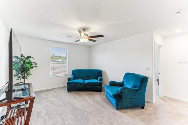 4323 Trotters Way, Lakeland, FL 33801 - living area with light carpet and ceiling fan